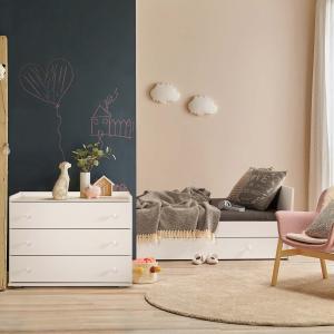 Decorative modern baby room with wooden crib bed and cabinet sty